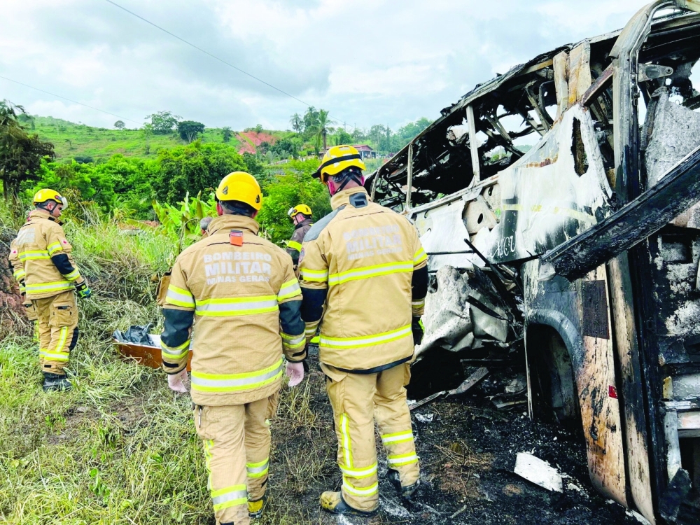 Firefighters attend to a traffic accident, Brazil