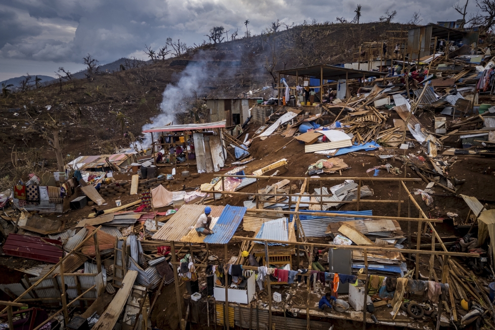 Homes destroyed by Cyclone Chido in the Passamainty slum area outside the capital of Mamoudzou in the French territory of Mayotte on Thursday, Dec. 19, 2024. (Sergey Ponomarev/The New York Times)