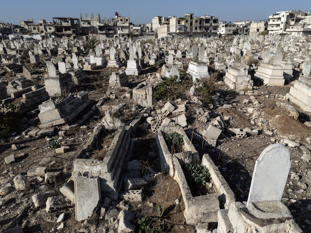 Rubble of a cemetery inside the destroyed neighborhood of Baba Amr, an area of Homs, Syria. TNYT