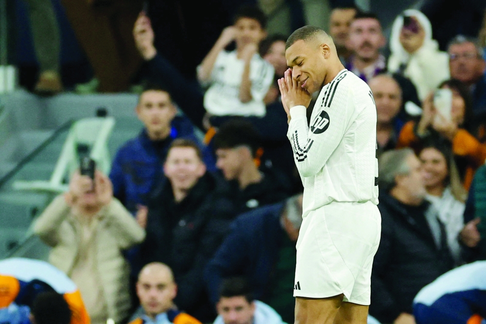  Kylian Mbappe celebrates scoring the opening goal  AFP