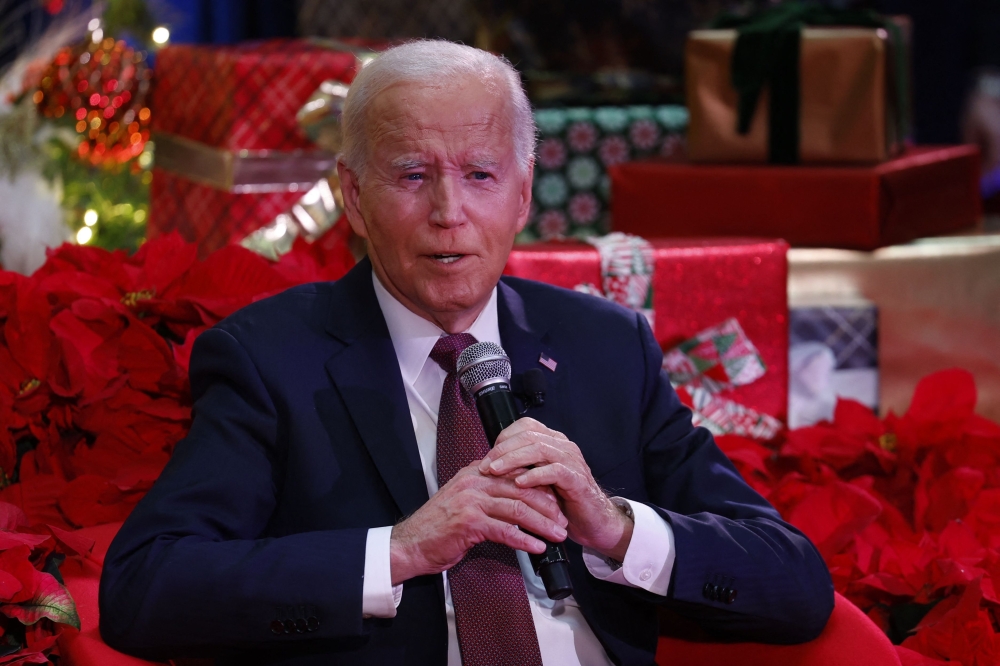 US President Joe Biden speaks during a holiday visit at Children National Hospital in Washington. — AFP 