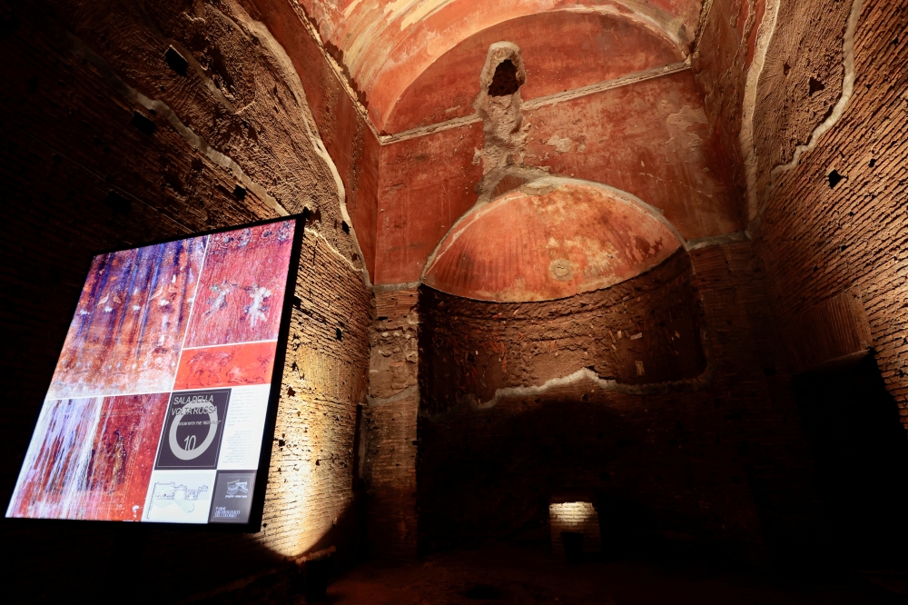 A display presents information as a new entrance and the renovated western side of The Domus Aurea, built by Nero in 64 A.D. and later buried by Emperor Trajan, are inaugurated in Rome, Italy, December 13, 2024. REUTERS/Remo Casilli
