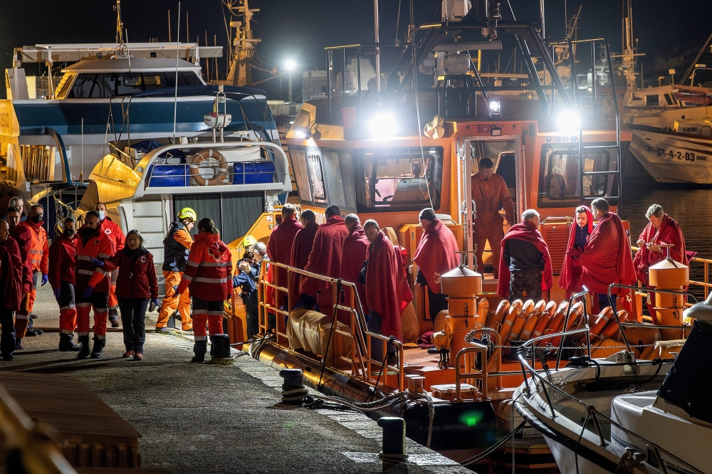 Survivors of the sinking of Russian cargo ship Ursa Major stand on the deck of a Spanish Maritime Rescue ship upon arrival at the port of Cartagena, Spain. — Reuters 