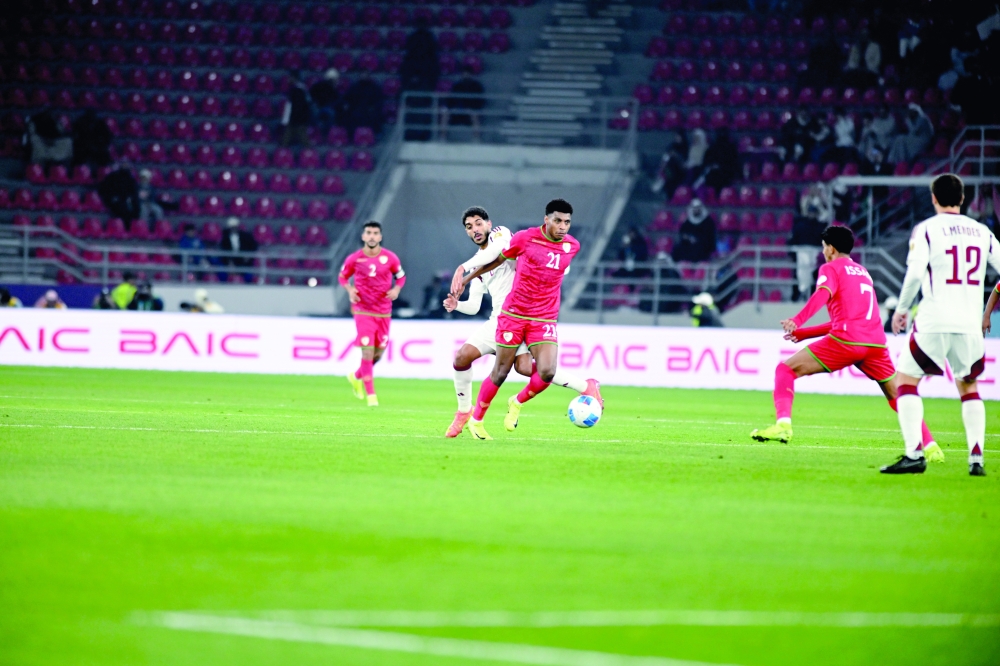 Issam brace brightens Oman's semifinal hopes