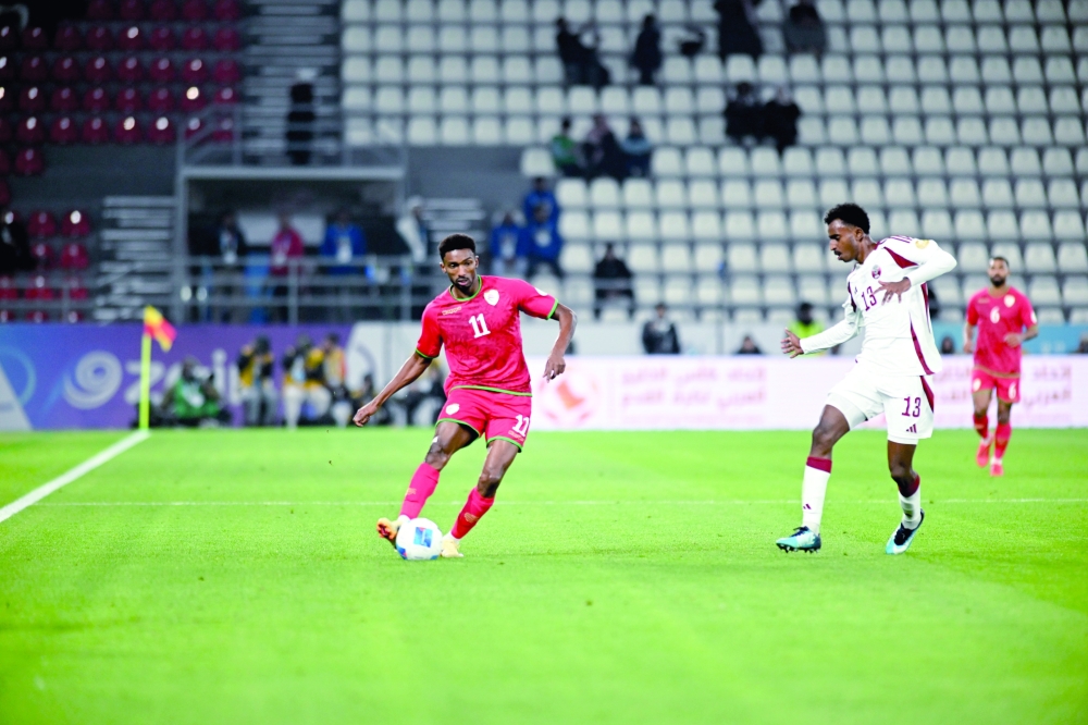 Issam brace brightens Oman's semifinal hopes