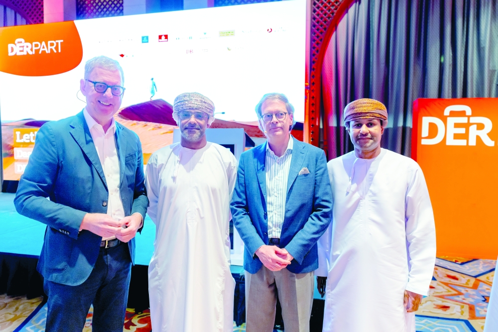 Azzan bin Qasim al Busaidy and Haitham bin Mohammed al Ghassani with Thomas Osswald, Managing Director, DERPART