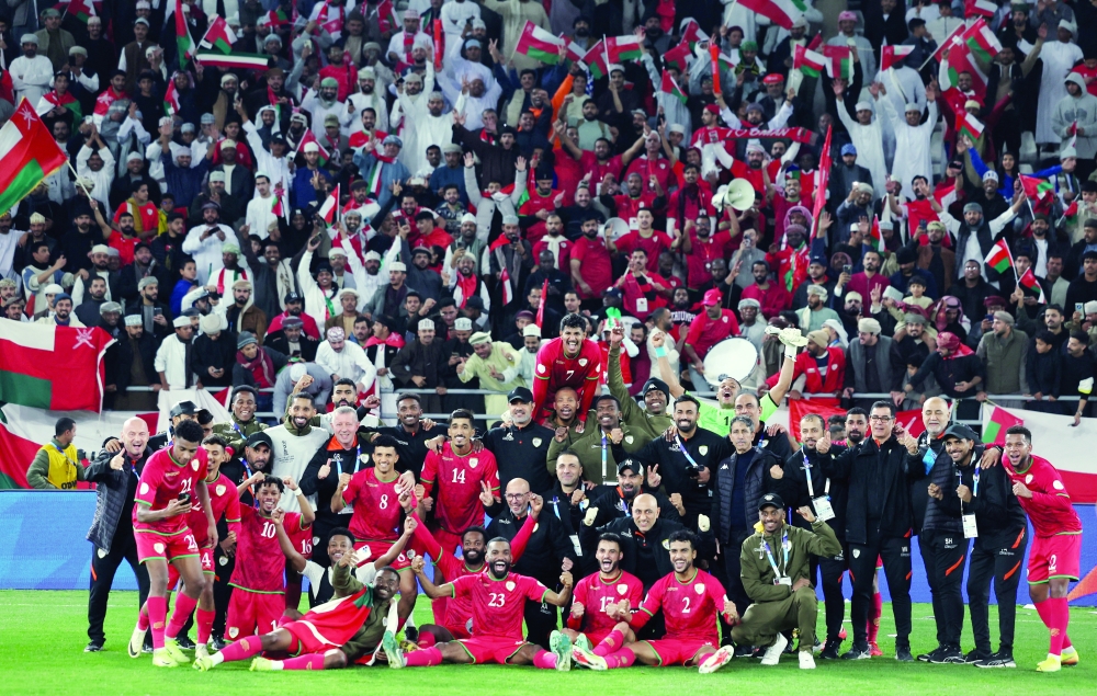 Soccer Football - Gulf Cup - Group A - United Arab Emirates v Oman - Jaber Al-Mubarak Al-Hamad Stadium, Kuwait City, Kuwait - December 27, 2024 Oman players and staff celebrate after the match REUTERS