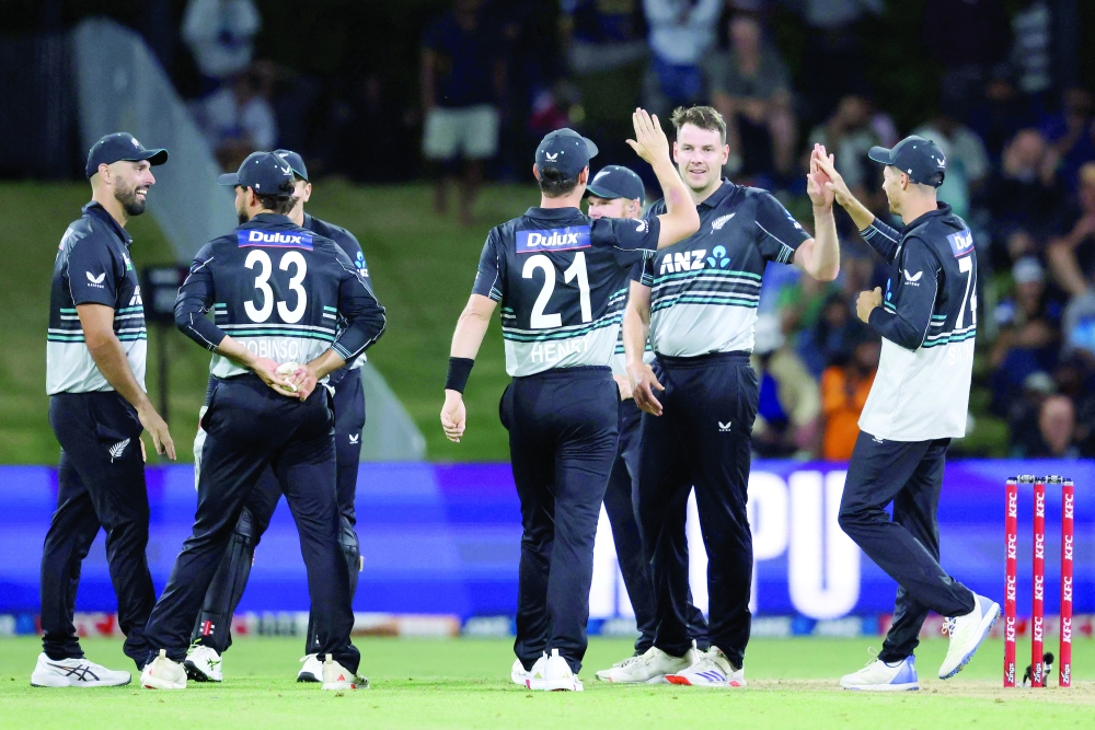 New Zealand's Jacob Duffy (C) celebrates the wicket of Sri Lanka's Kamindu Mendis during the first Twenty20 cricket match between New Zealand and Sri Lanka at Bay Oval in Mount Maunganui on December 28, 2024. (Photo by Michael BRADLEY / AFP)