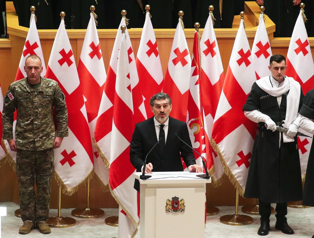 Mikheil Kavelashvili, elected by lawmakers as Georgia's new President, takes the oath during his swearing-in ceremony at the parliament in Tbilisi. — AFP 