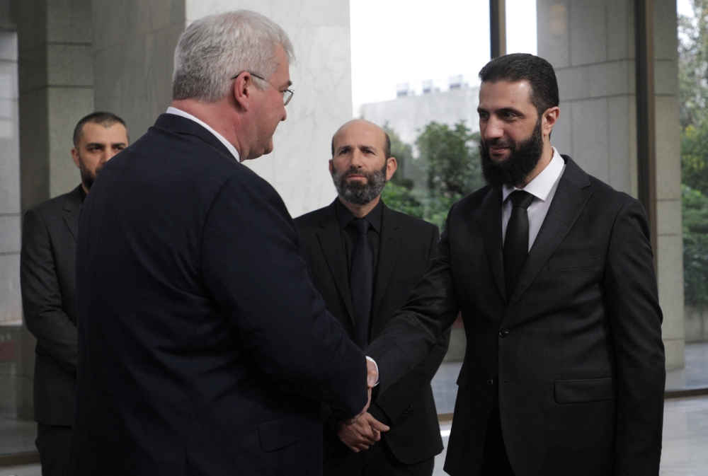Syria's leader Ahmed al-Sharaa meets with Ukrainian Foreign Minister Andrii Sybiha 