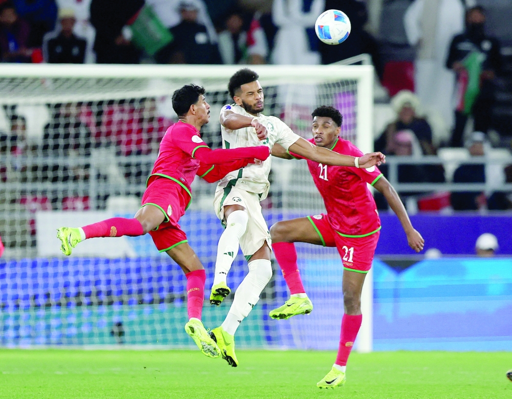 Oman's Abdulrahman al Mushaifri in action with Saudi Arabia's Ali al Bulayhi REUTERS/Mohamed Abd El Ghany