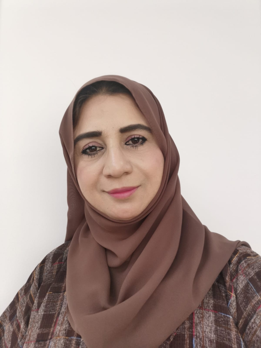  Sariya Khalfan Al Hadi, Member of the State Council and Member of the Legal Committee of the Council