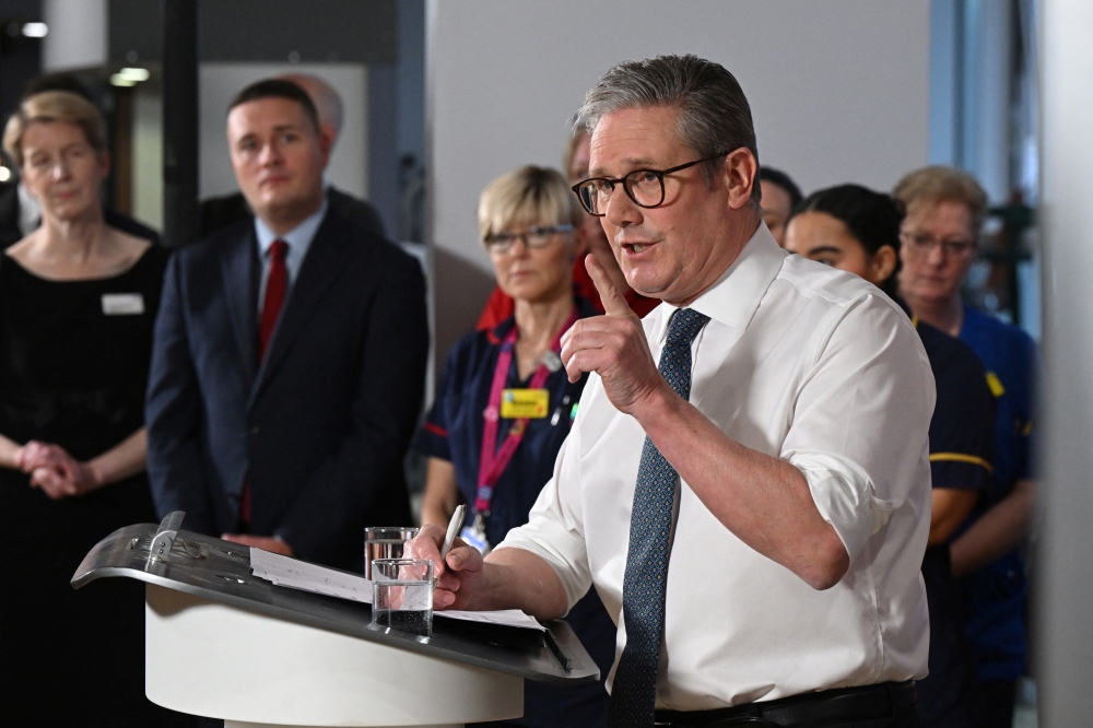 Britain's PM Keir Starmer gives a speech as he visits a healthcare provider in Surrey, in Epsom, Britain. — Reuters 