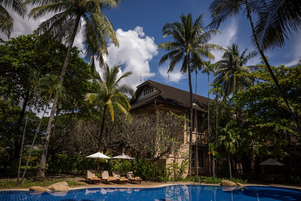 A view of the pool area at the Settha Palace Hotel on October 20, 2024 in Vientiane, Laos. (Lauren DeCicca/The New York Times)