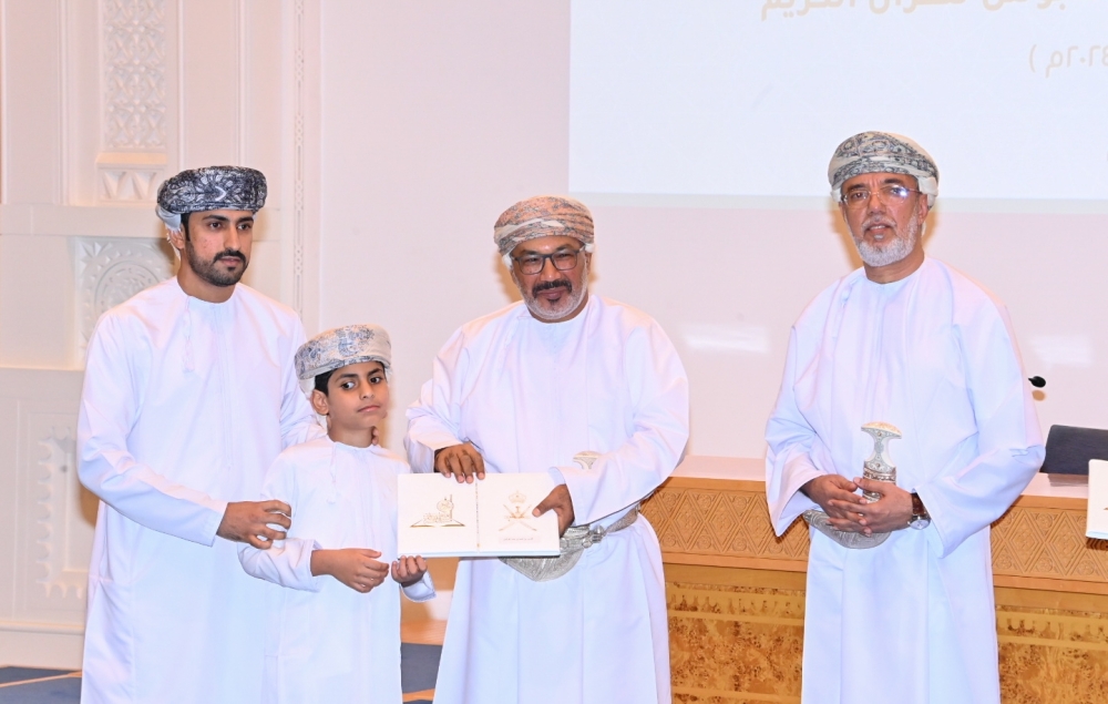 Dr Khamis bin Saif Al Jabri felicitating a winner at the Sultan Qaboos Grand Mosque in Muscat on Wednesday