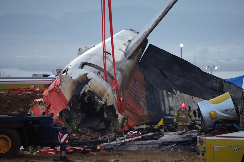 The wreckage of Jeju Air Flight 7C2216 at Muan International Airport in Muan, South Korea, on Monday, Dec. 30, 2024.  (Chang W. Lee/The New York Times)