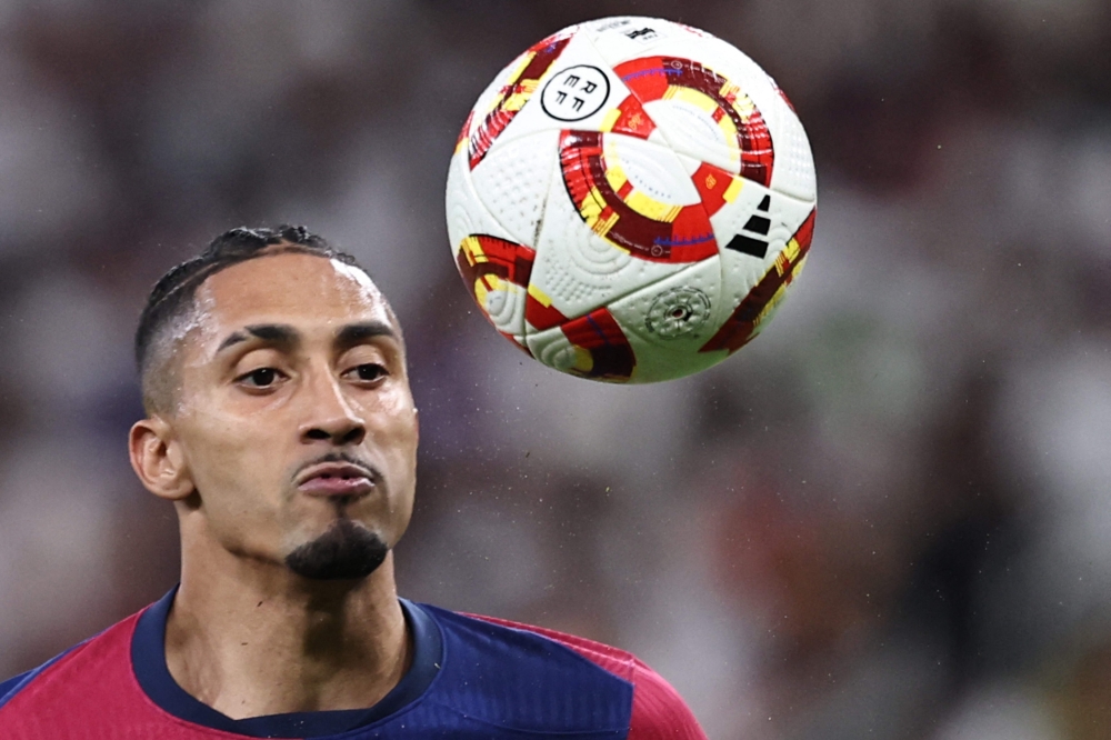  Raphinha controls the ball during the Spanish Super Cup — AFP