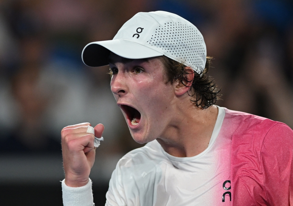 Tennis - Australian Open - Melbourne Park, Melbourne, Australia - January 14, 2025 Brazil's Joao Fonseca reacts during his first round match against Russia's Andrey Rublev REUTERS/Jaimi Joy
