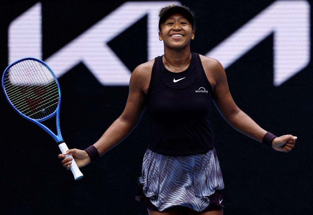 Japan's Naomi Osaka celebrates winning her second round match 