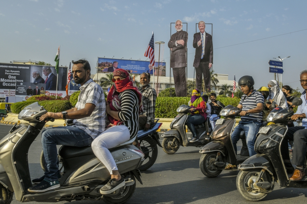 Large cutout images of India’s Prime Minister Narendra Modi and then President Donald Trump grace a roundabout ahead of an official visit by Trump, in Ahmedabad, India, FEb. 23, 2020. (Atul Loke/The New York Times)