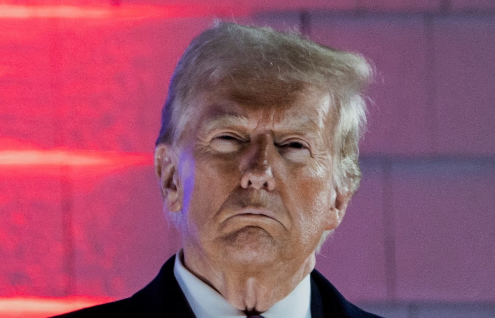 US President-elect Donald Trump watches fireworks at Trump National Golf Club Washington DC in Sterling, Virginia, US, on Sunday. - AFP