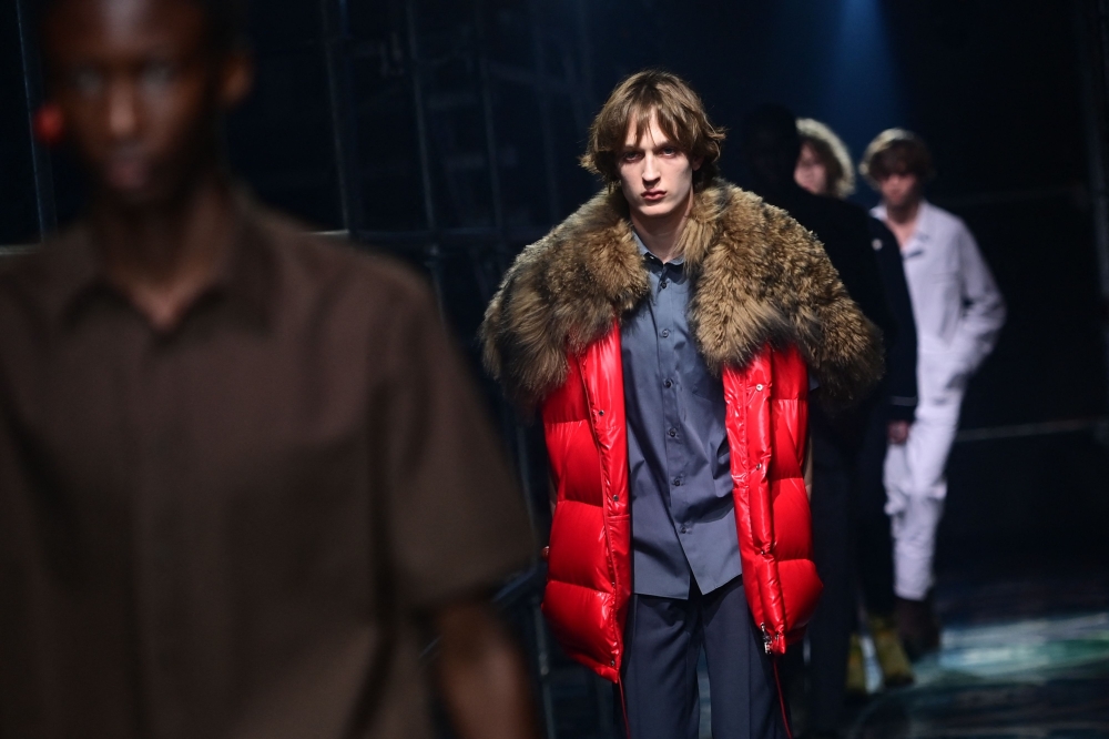 A model walks the runway during the Prada collection show at Milan's Fashion Week Men's Fall / Winter 2025-2026 in Milan, Italy, on January 19, 2025 (Photo by Piero CRUCIATTI / AFP)

