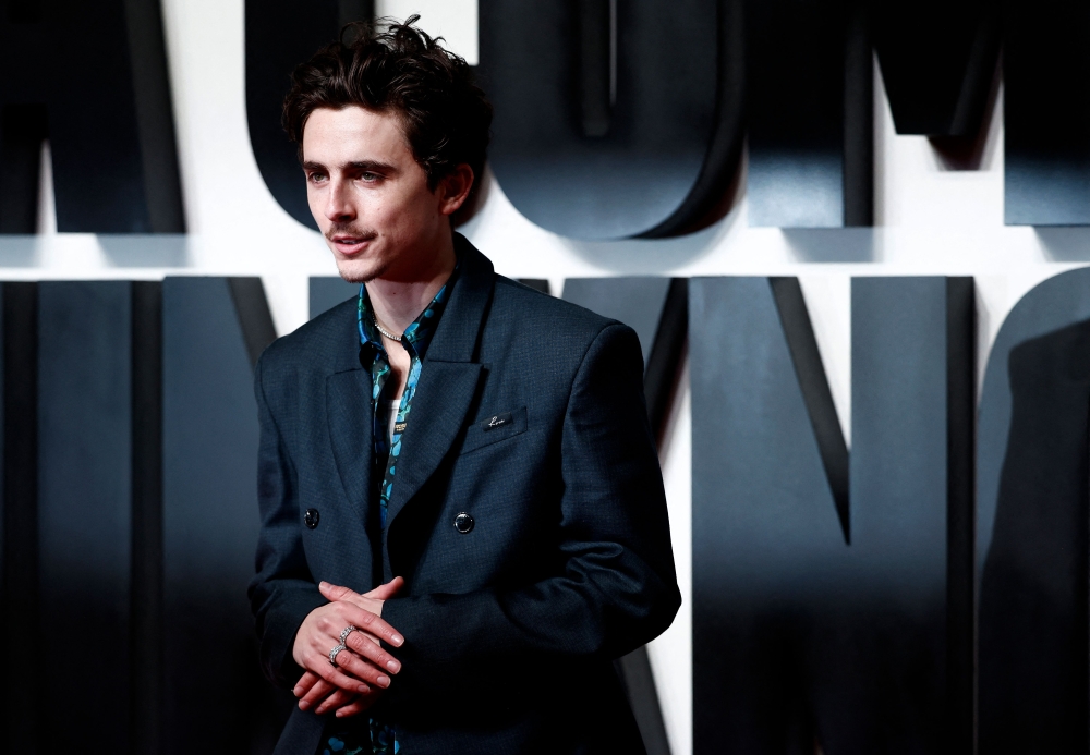 US-French actor Timothee Chalamet poses on the red carpet upon arrival for the UK Premier of the movie "A Complete Unknown" at the BFI Southbank in London, on January 14, 2025. (Photo by BENJAMIN CREMEL / AFP)

