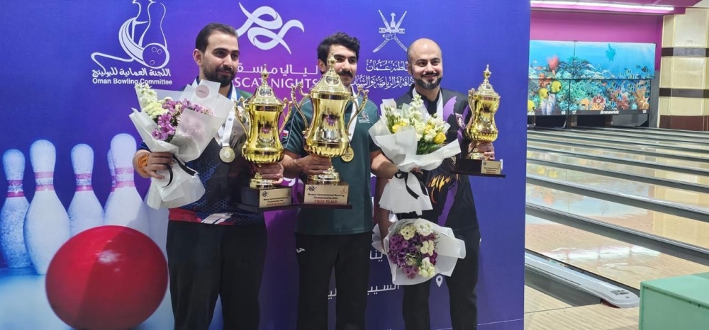 Top three winners, Oman's Musab al Adawi (C) with Kuwait’s Aseel al Roumi (L) and Mahmoud al Attar of the UAE.