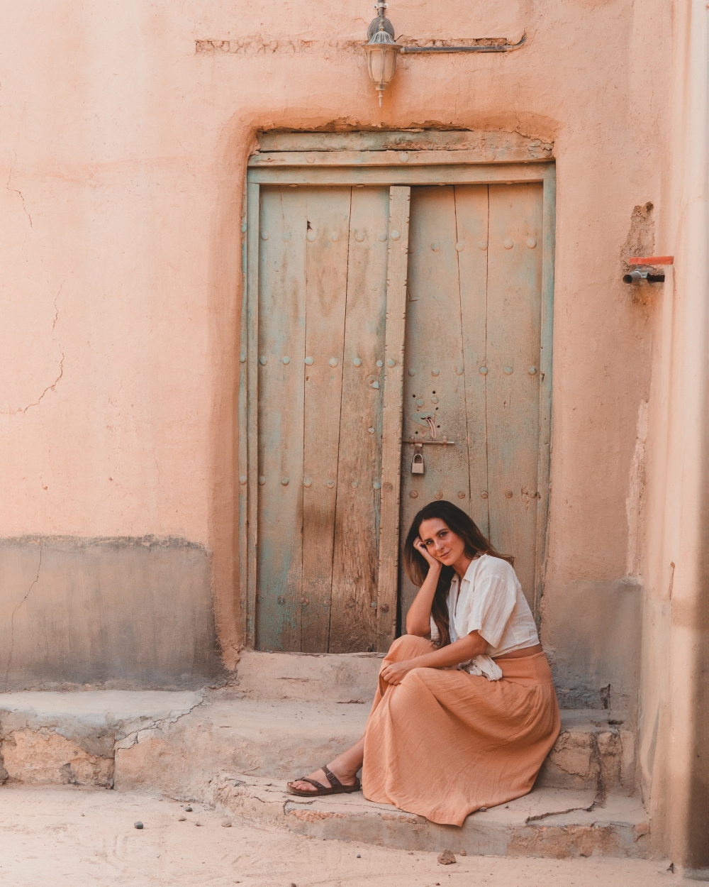 Digital creator Lauren Carey at an abandoned village in Al Hamra