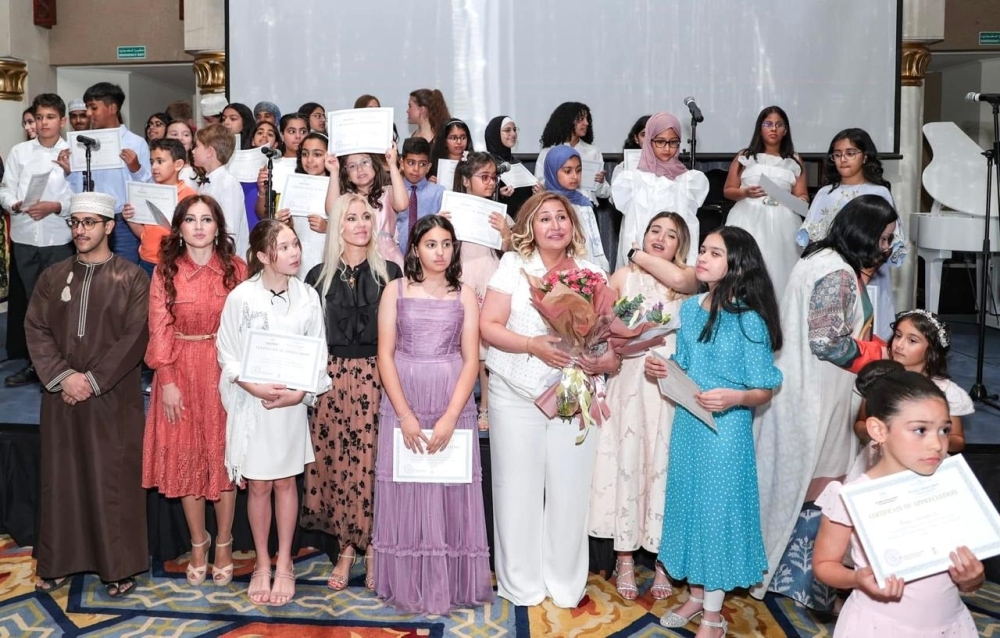 Dr Saida Khalilova with her music students after a concert convocation event