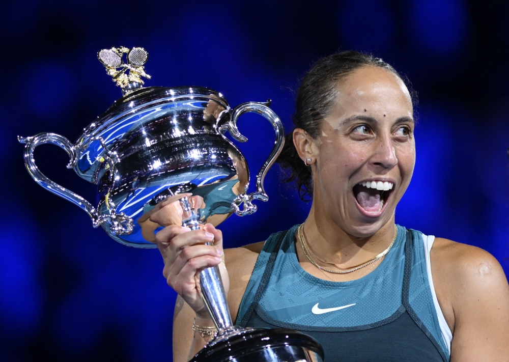 Madison Keys of the US celebrates with the trophy after winning the final against Belarus' Aryna Sabalenka.— Reuters