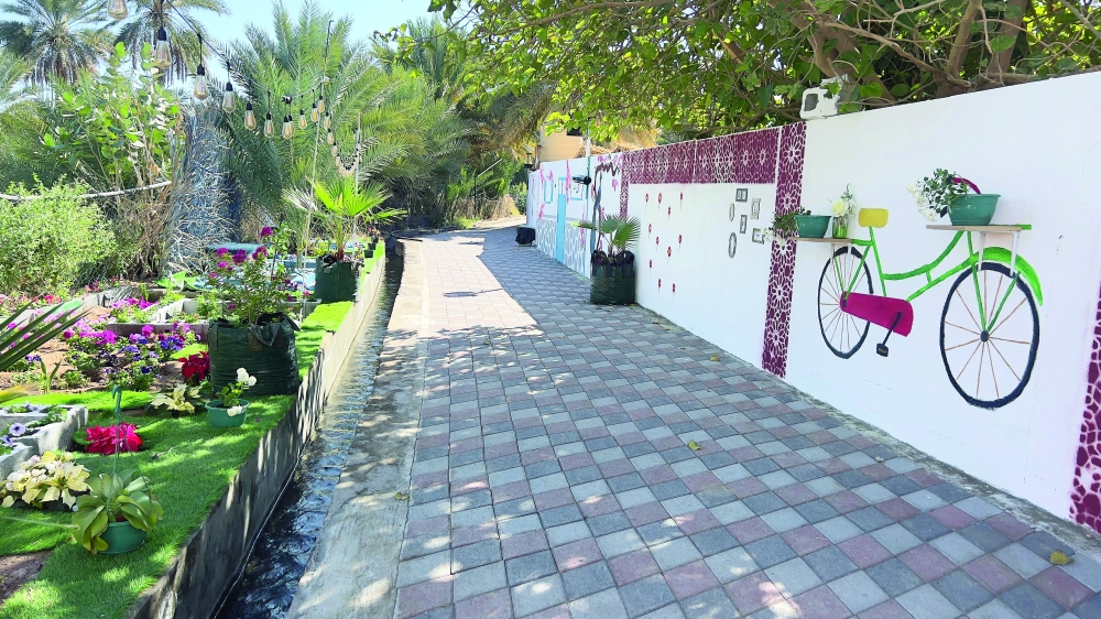  As part of the initiative, nine local families participated in a beautification competition. Each family was assigned a section of the path to decorate using sustainable local materials.