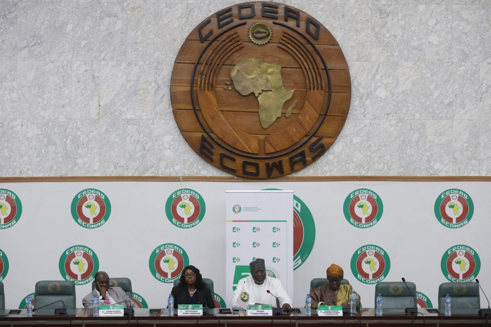 ECOWAS delegates during a media briefing to announce the states exit in Abuja. — AFP
