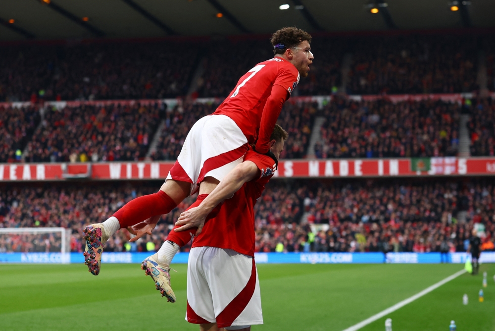 Nottingham Forest's Chris Wood celebrates scoring third goal. — Reuters
