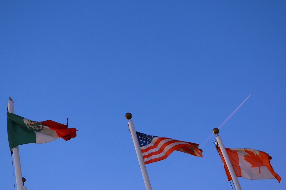 The flags of Mexico, the United States and Canada fly in Ciudad Juarez, Mexico February 1, 2025. 
