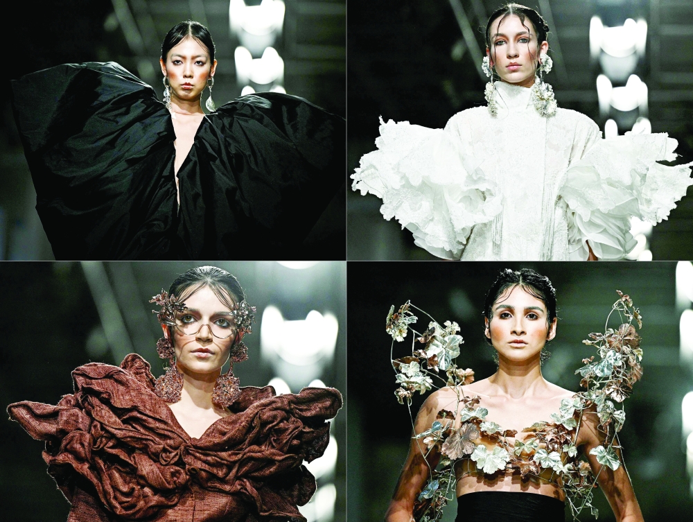 This combination of pictures created on January 30, 2025 shows
models presenting creations for Juana Martin during the Women's Haute-Couture Spring/Summer 2025 Fashion Week, in Paris on January 30, 2025.