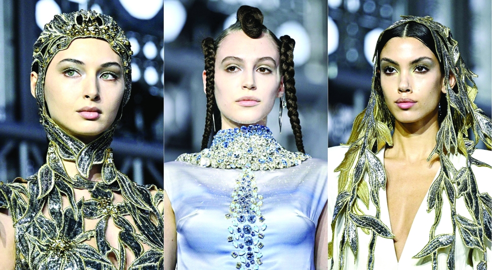 This combination of pictures created on January 30, 2025 shows
models presenting creations for Maison Sara Chraibi during the Women's Haute-Couture Spring/Summer 2025 Fashion Week, in Paris on January 30, 2025.