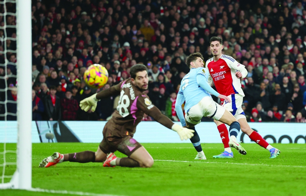 Soccer Football - Premier League - Arsenal v Manchester City - Emirates Stadium, London, Britain - February 2, 2025 Arsenal's Kai Havertz scores their fourth goal REUTERS