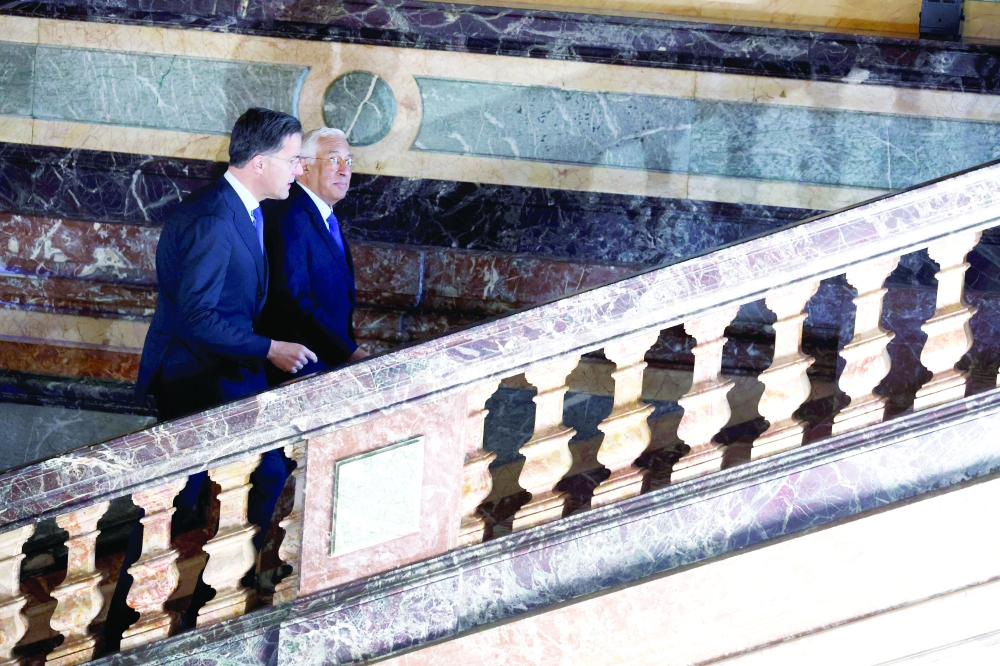 Nato Secretary General Mark Rutte (L) speaks with European Council President Antonio Costa as he arrives at an EU summit at the Egmont Palace in Brussels. — Reuters