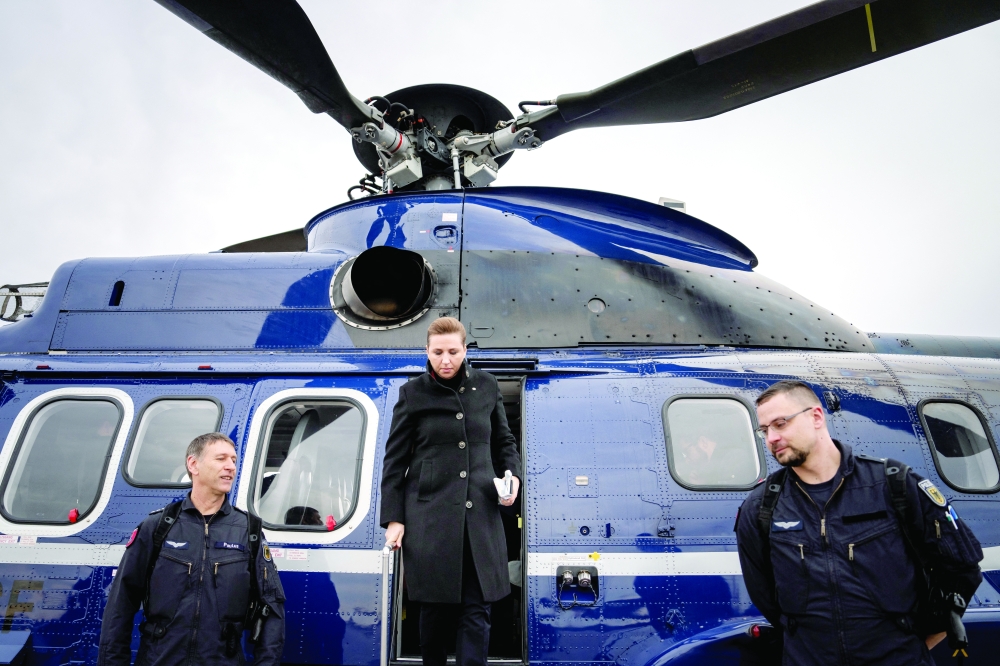 Prime Minister Mette Frederiksen leaves the helicopter after her visit to the German Chancellor Olaf Scholz in Berlin. — Reuters file photo