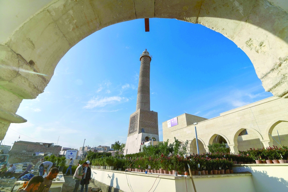 Iraq's famed 'hunchback' of Mosul rebuilt brick by brick