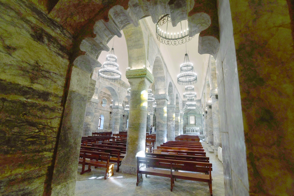 Iraq's famed 'hunchback' of Mosul rebuilt brick by brick