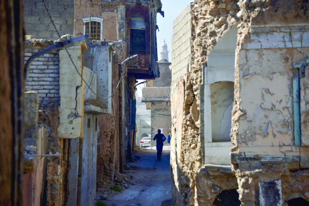 Iraq's famed 'hunchback' of Mosul rebuilt brick by brick