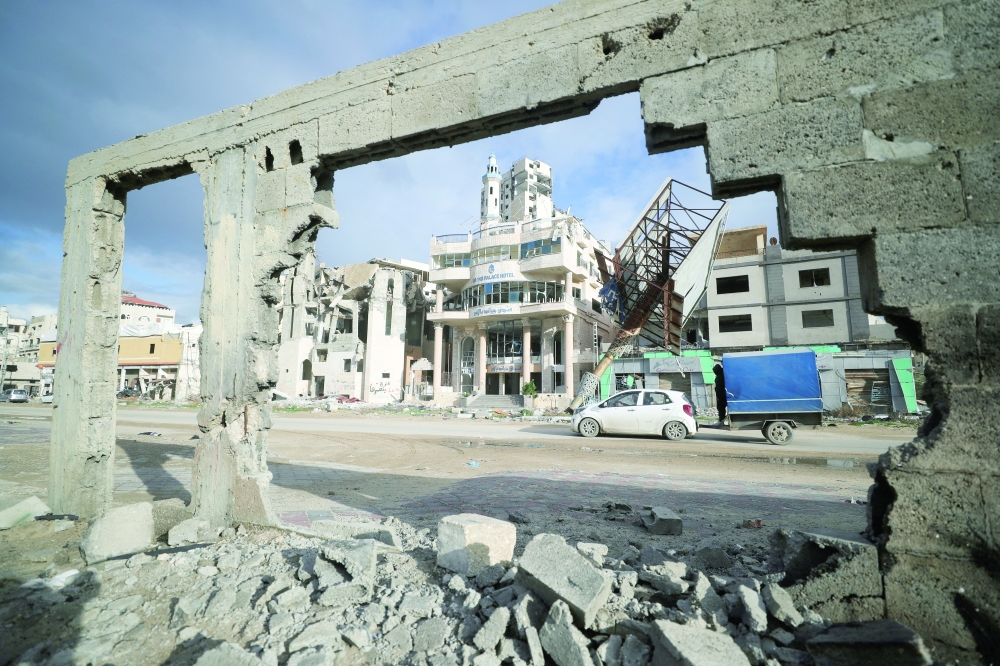 The Grand Palace hotel stands damaged, amid a ceasefire between Israel and Hamas, after a proposal by US President Donald Trump for the US to take over Gaza and displace its residents, in Gaza City. - Reuters
