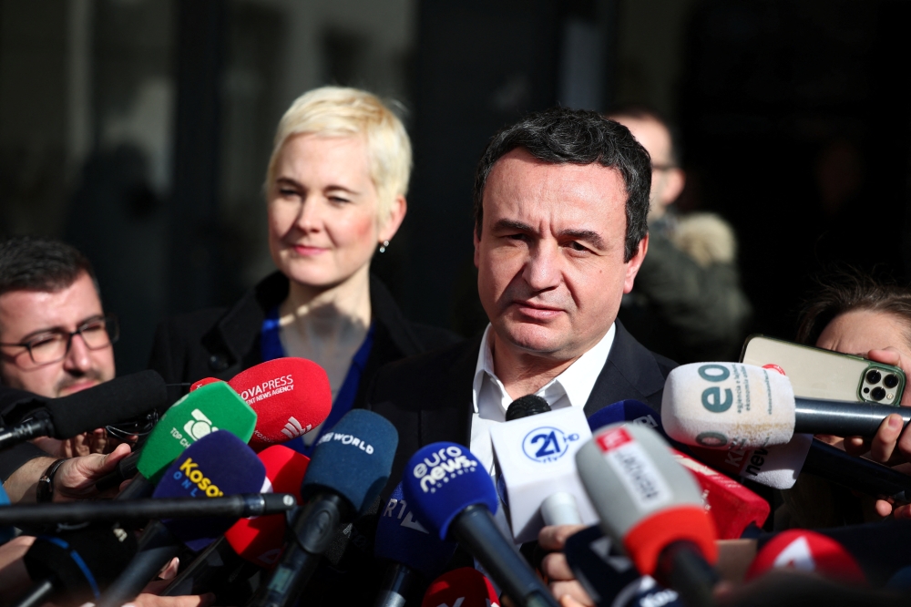 Kosovo's prime minister Albin Kurti speaks to the media after voting during the parliamentary elections in Pristina. — Reuters 