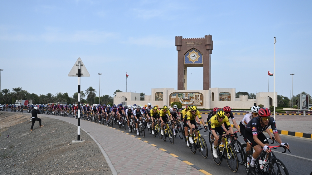 Participants pass in front of Burj Al Sahwa roundabout