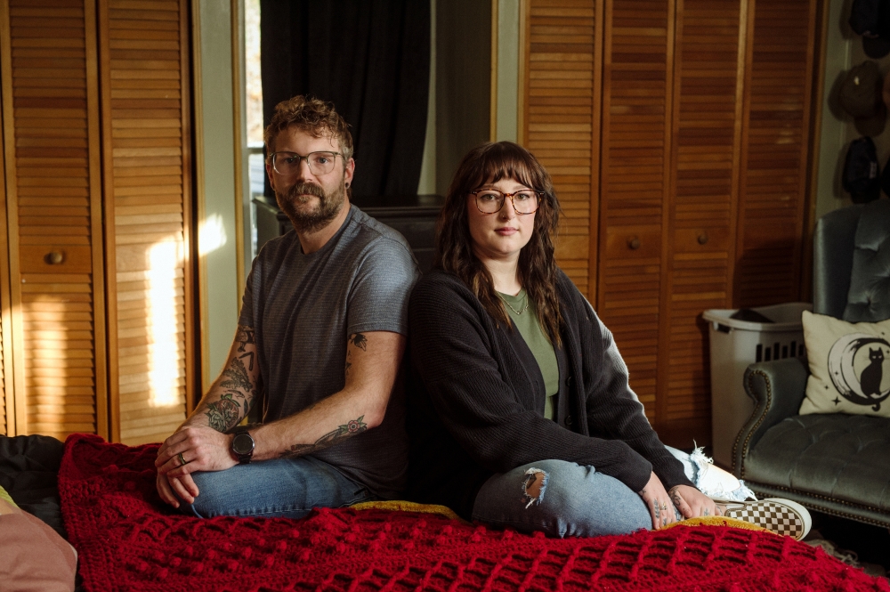 Shawn and Carlyle Button created their money-managing arrangement. I take the heavier weight of bills because Shawn manages our savings account, Carlyle Button says. (Mike Belleme/The New York Times)