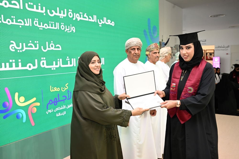 Dr Laila bint Ahmed al Najjar, Minister of Social Development gives certificate to one of the trainees of 'Be with Us for Them’ in Muscat on Monday