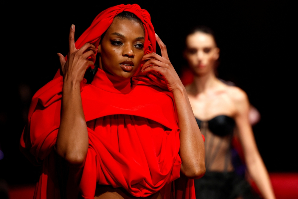 Models present creations from Christian Siriano during New York Fashion Week Fall-Winter 2025 in New York City, U.S., February 6, 2025. REUTERS/Shannon Stapleton
