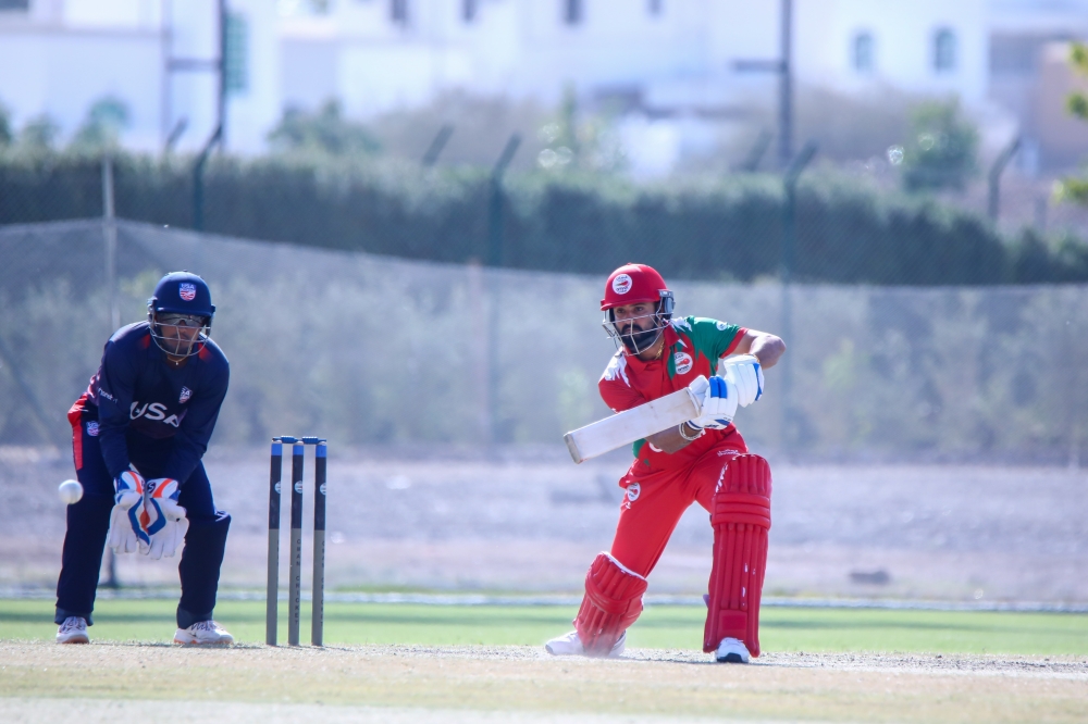 Oman's Jatinder Singh plays a shot.